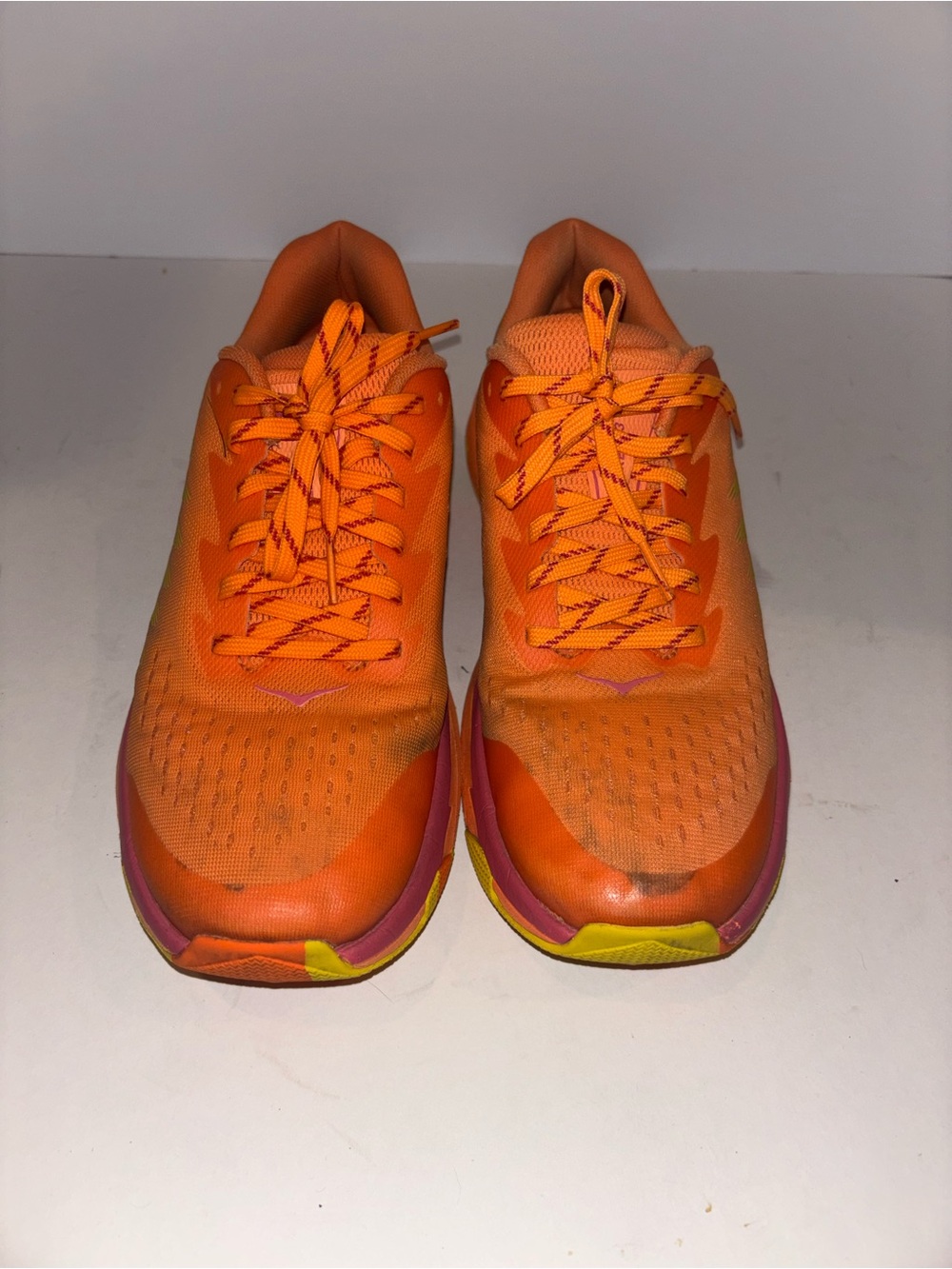 Hoka Women's Bright Orange Running Sneakers with Pink and Yellow Details